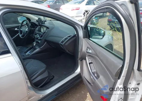 2014 Ford Focus Titanium from USA, damaged, VIN 1FADP3J28EL223087